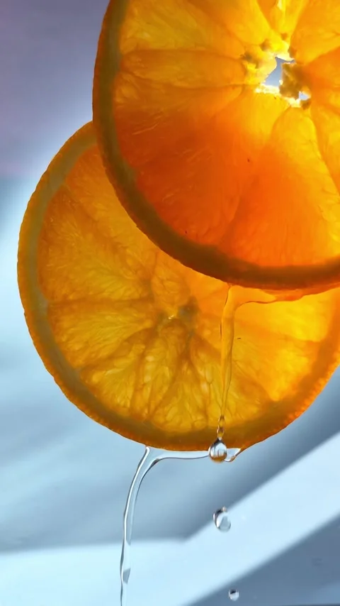 Orange sliced ​​close-up in motion Video stock 304665082