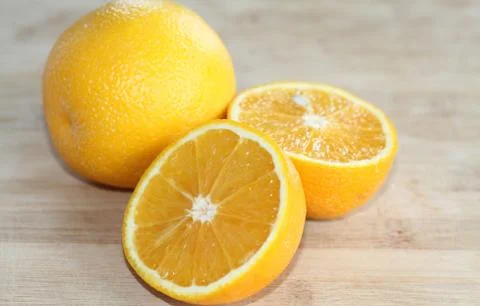 Orange sliced in half Stock Photos