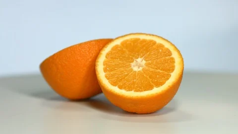 Orange sliced rotating Stock Footage 96076141