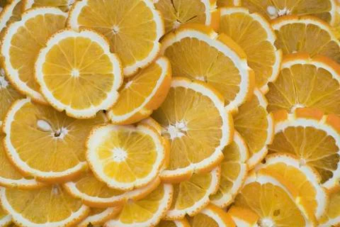Orange slices as background texture Stock Photos