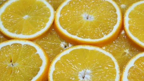 Orange Slices In Extreme Close Up background Video stock 97300726