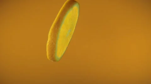 Orange slices fly and spin Stock Footage 48485627