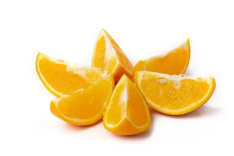 Orange slices ispread out in the form of the sun solated on white background. Stock Photos