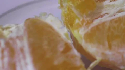 Orange slices on a plate Stock Footage 172334026