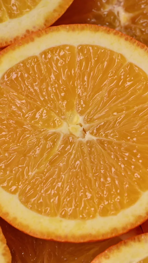 Orange slices rotating macro loop, juicy citrus branding background. Stock-Footage 332219952