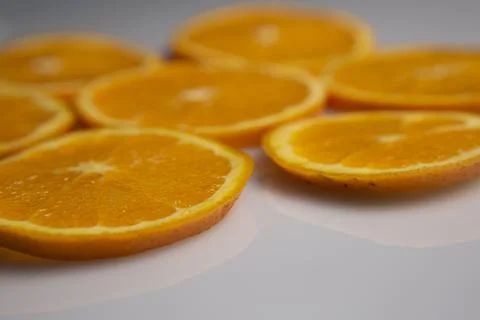 Orange slices on white background Stock Photos