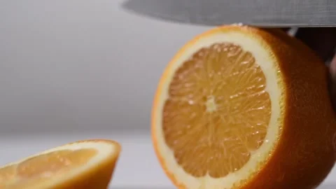 Orange slicing closeup, slow motion. Stock Footage 131978186