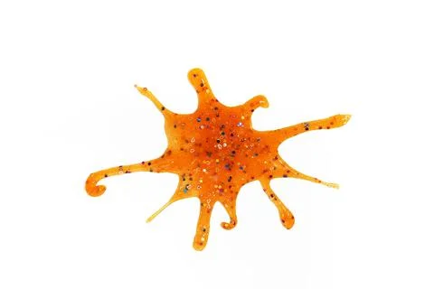 Orange slime with sequins on white background Stock Photos