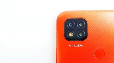 Orange smartphone with Artificial Intelligence (AI) cameras. Foto stock