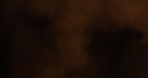 Orange smoke isolated on black background Video stock 89964341