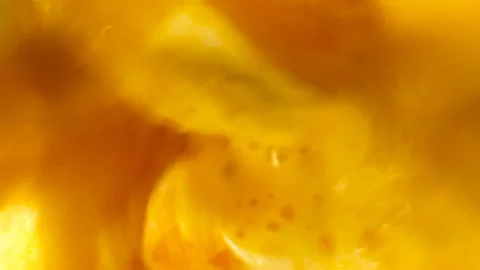 Orange smoothie in a blender. Stock Footage 117442793