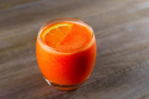 Orange smoothie, cold refreshing drink, top view. Organic detoxi Stock Photos