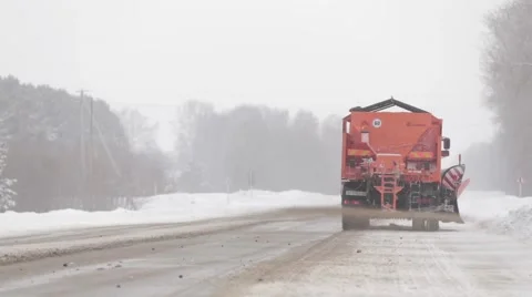 A orange snow plow truck Stock Footage