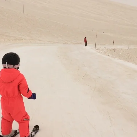 Orange snowfall hits Winter Olympics site in Sochi, Russia Stock Footage 106313519