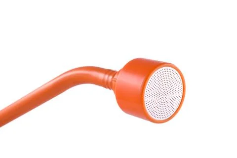 Orange soft watering nozzle isolated on white background Stock Photos