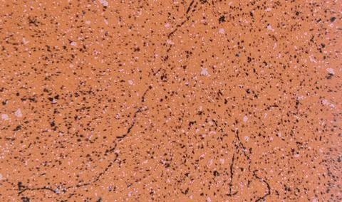 Orange Speckled Granular Surface Texture Close Up Stock Photos