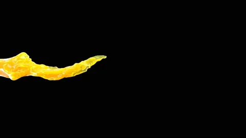 Orange splash juice stream on black Super slow motion 1000 fps Stock Footage 142021280