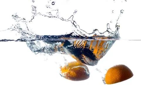 Orange splash Stock Photos
