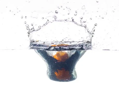 Orange splash Stock Photos