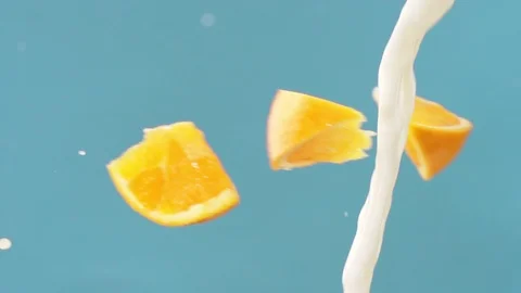 Orange Splashing into Milk 스톡 동영상 108308634
