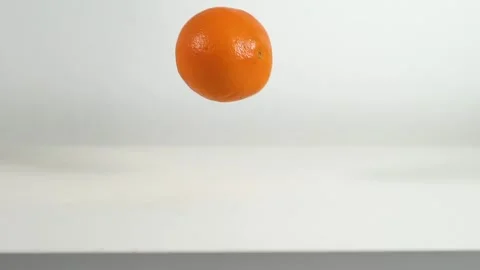 Orange splitting in 4 pieces Stock Footage 145326721