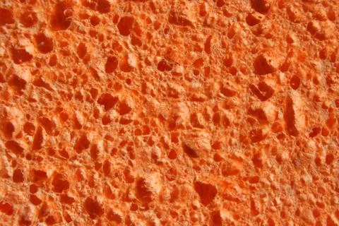 Orange sponge background Stock Photos