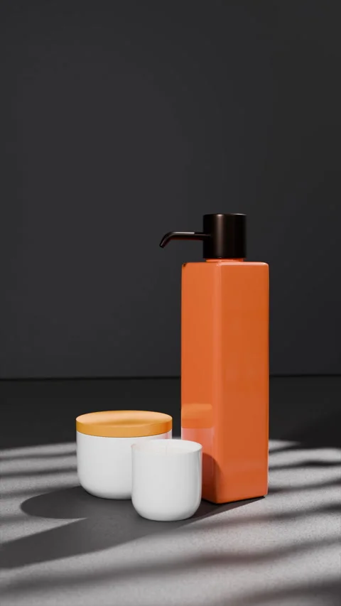 Orange square liquid soup bottle dispenser with black lid, ceramic candle, jar Stock Footage 313555744