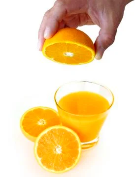 Orange squeezing Stock Photos
