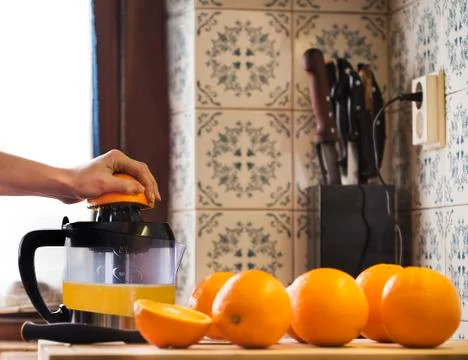 Orange squeezing Stock-Fotos