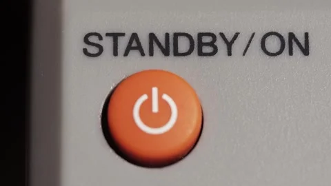 Orange Standby On Power Button Pressed Close Up Stock Footage 333007653