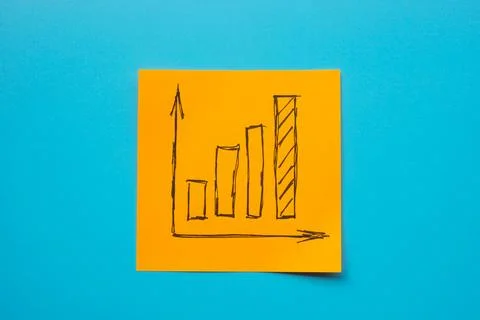 An orange sticker with a growing graph symbolizing business success, growth and Foto stock