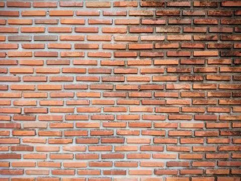Orange stone brick wall Stock Photos