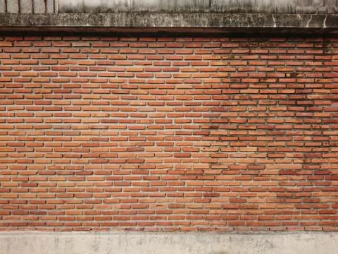 Orange stone brick wall Stock Photos