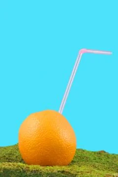 Orange with straw Foto stock