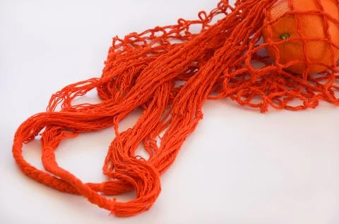 Orange string bag Foto stock