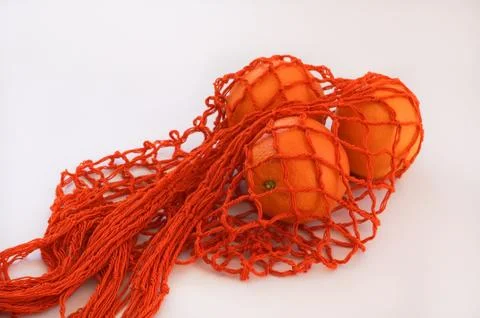 Orange string bag Foto stock