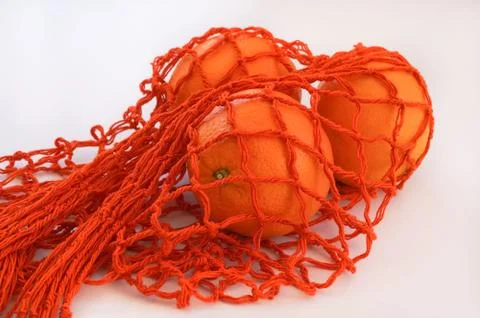 Orange string bag Stock Photos
