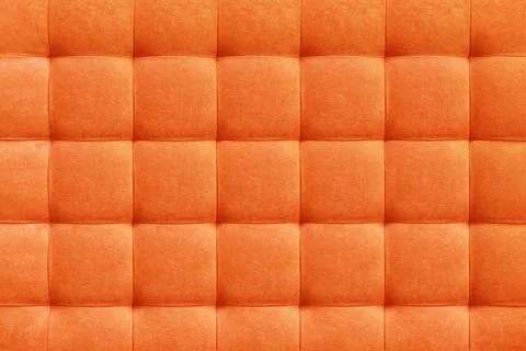 Orange suede leather background, classic checkered pattern for furniture, w.. Stock Photos