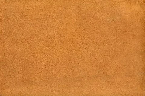 Orange suede leather texture background Stock Photos