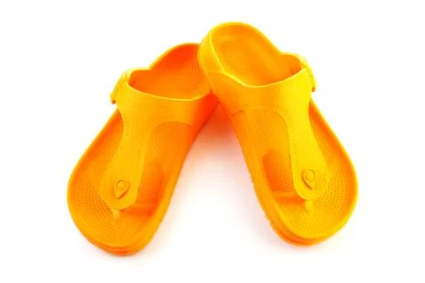 Orange summer slippers Stock Photos