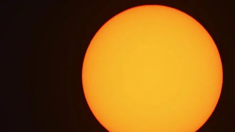 Orange sun ball close up moving frame in black background. No sunspots active Stock Footage 147663609