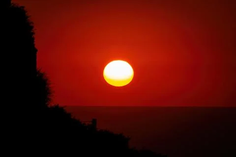 Orange sun disk Stock Photos