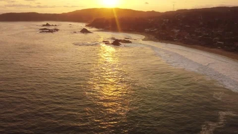 Orange sun reflection on tranquil ocean surface Stock Footage 331553134