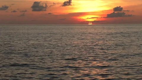 Orange sunrise on a calm sea Stock Footage
