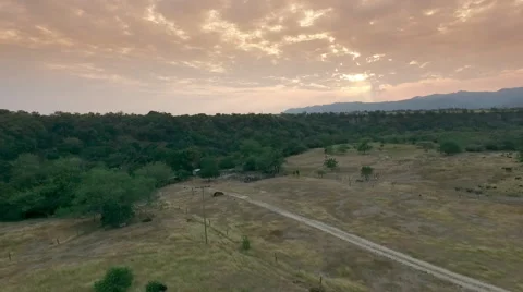 Orange sunset above a farm Video stock 63749505