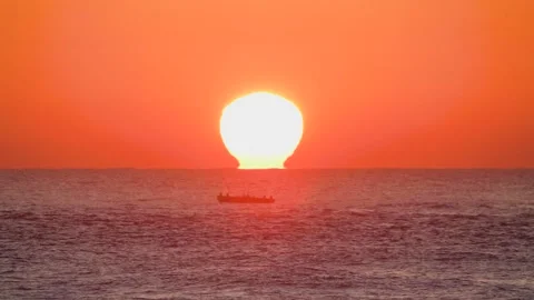 An orange sunset in the background Stock Footage 155593402