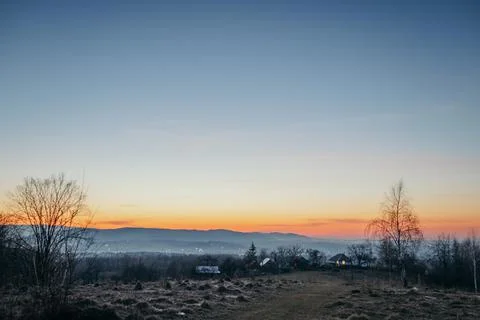 An orange sunset in the background Stock Photos