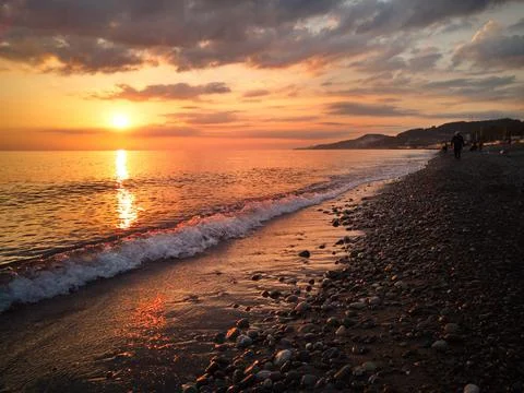 Orange sunset on the beach 스톡 사진
