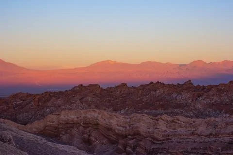 Orange sunset between the eroded rock stones of the Atacama Desert Stock Photos