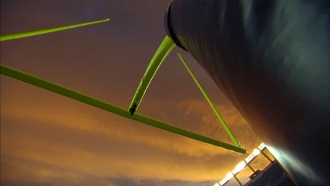 Orange sunset clouds over the goalpost on the NFL field Stock Footage 113275816